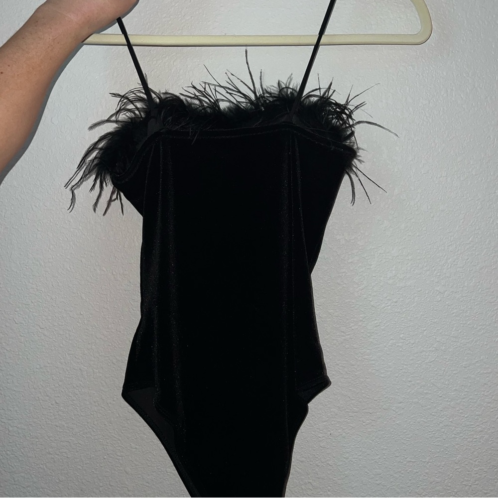 Black velvet body suit with feather detail